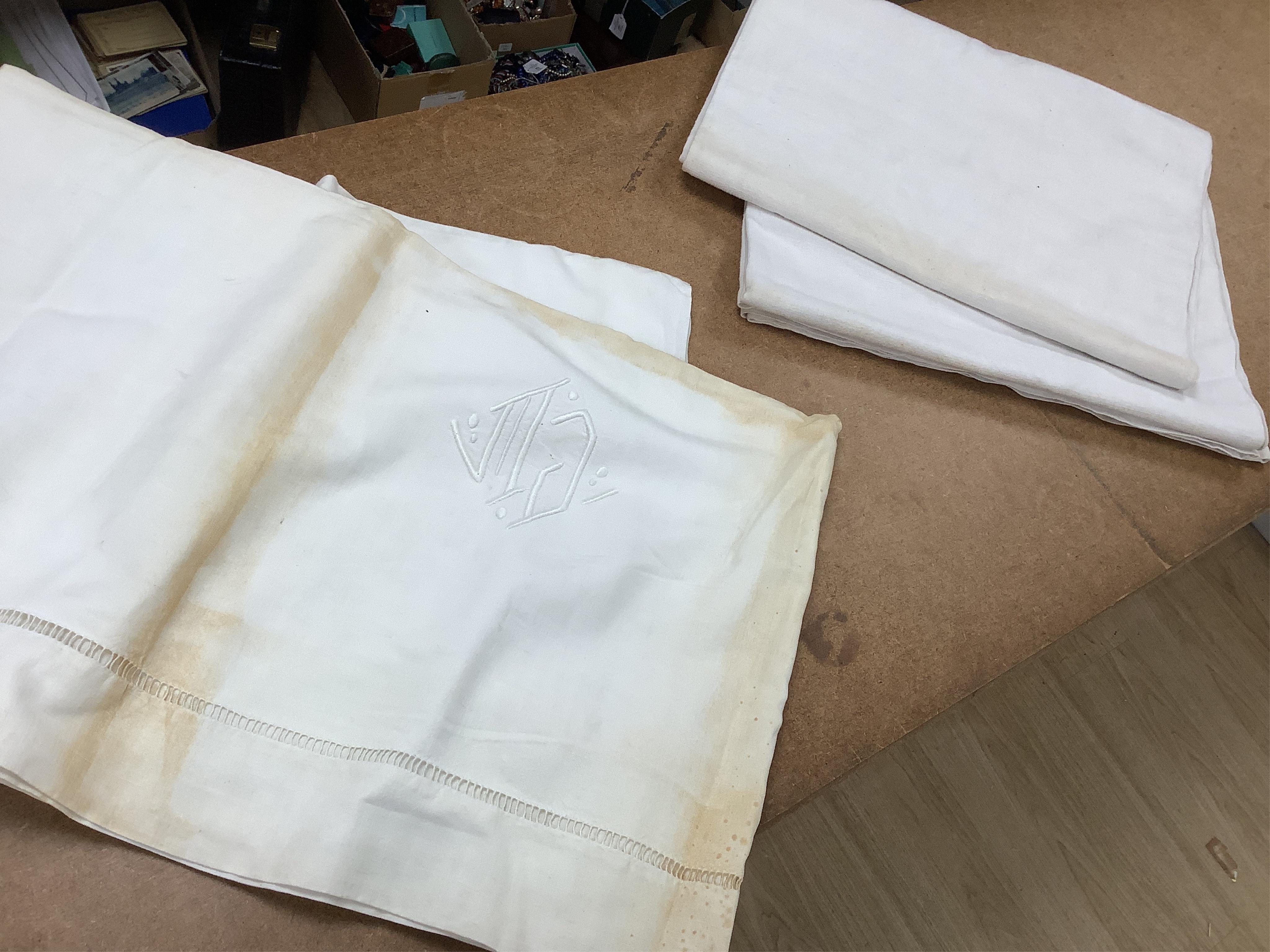 Fifteen French provincial monogrammed or embroidered linen and cotton sheets (2 boxes)